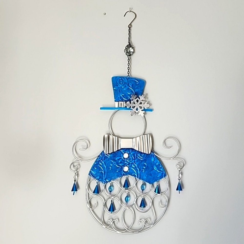 Metal Snowman. 22 inches long and 11 inches wide.
